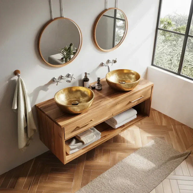 Farmhouse bathroom with floating wood vanity, gold vessel sinks, and round mirrors