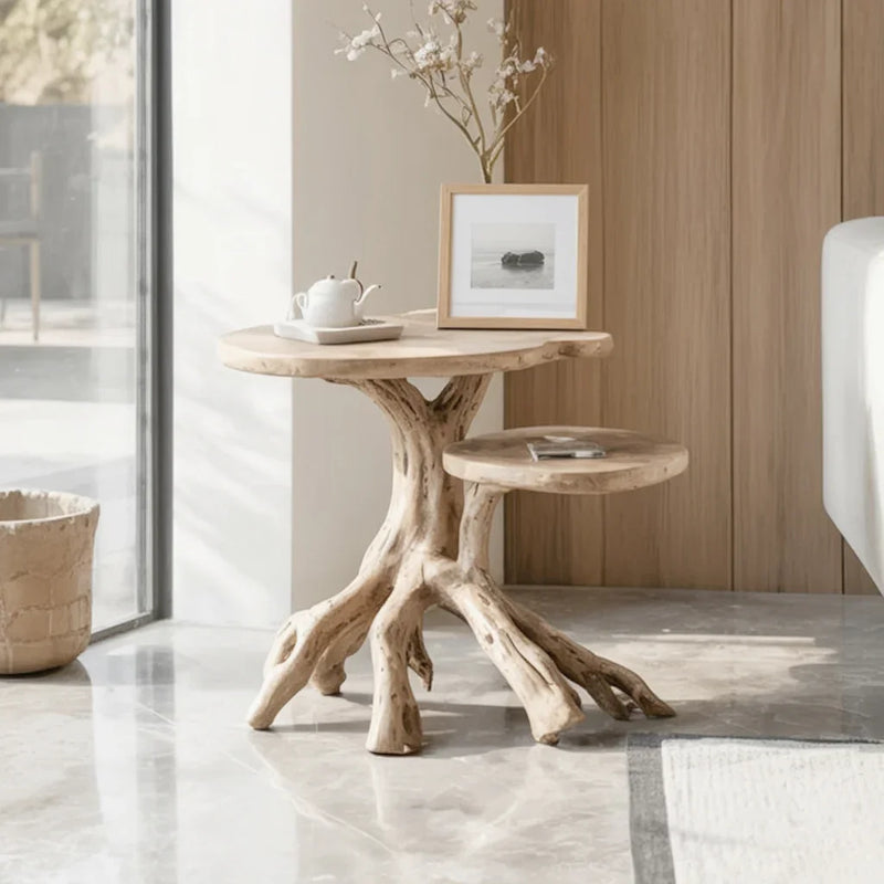 Solid wood live edge side table with natural branch base in modern living room setting