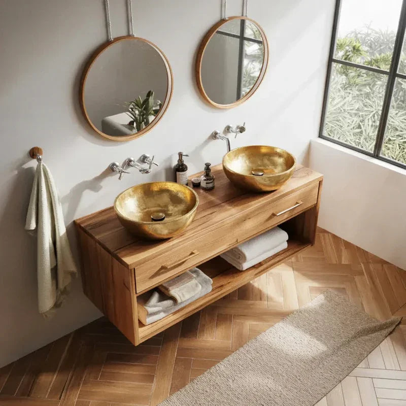 Farmhouse bathroom with floating wooden vanity, double gold vessel sinks, and round mirrors