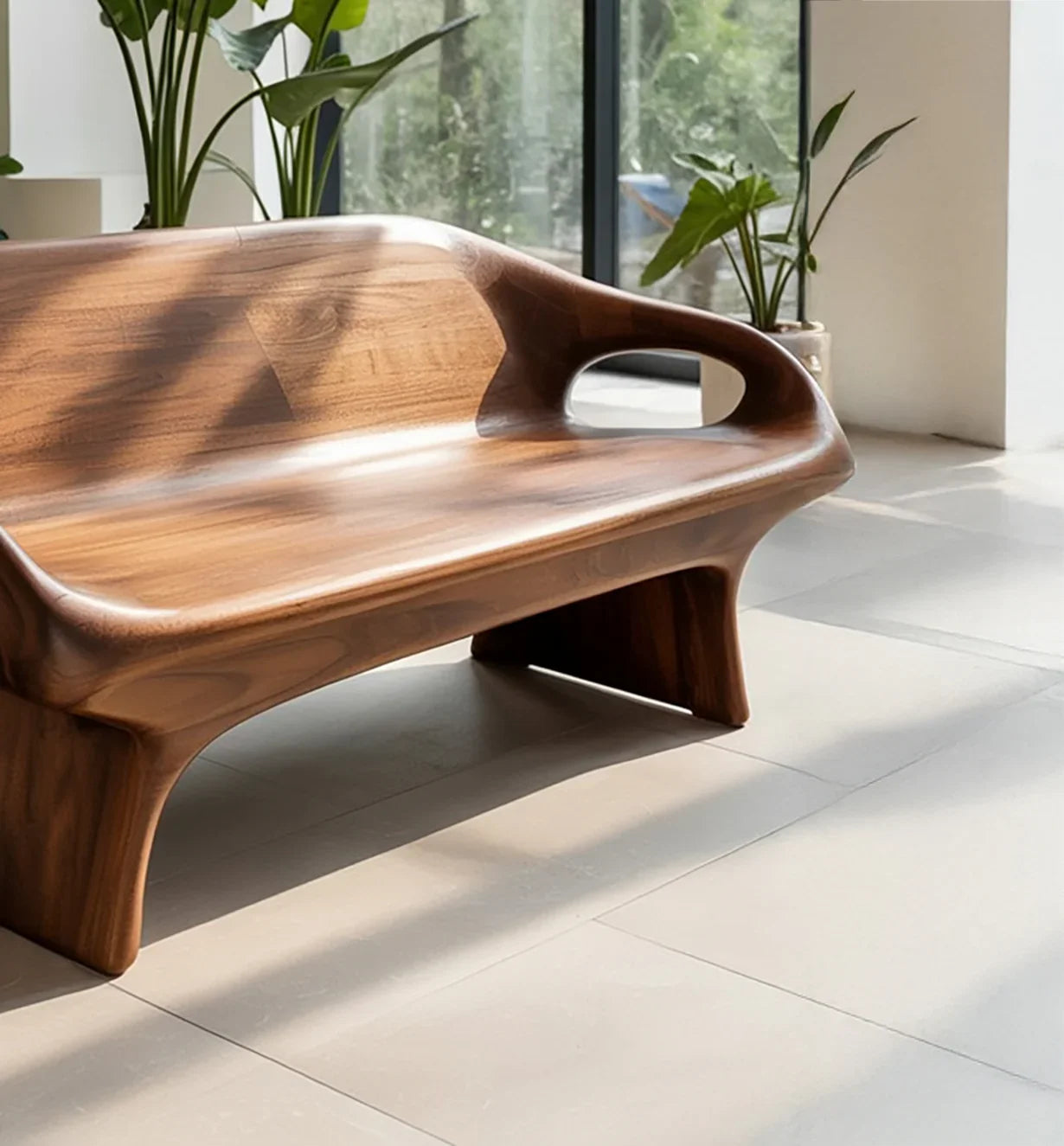 Modern wooden bench with smooth curves in bright room near window and potted plants
