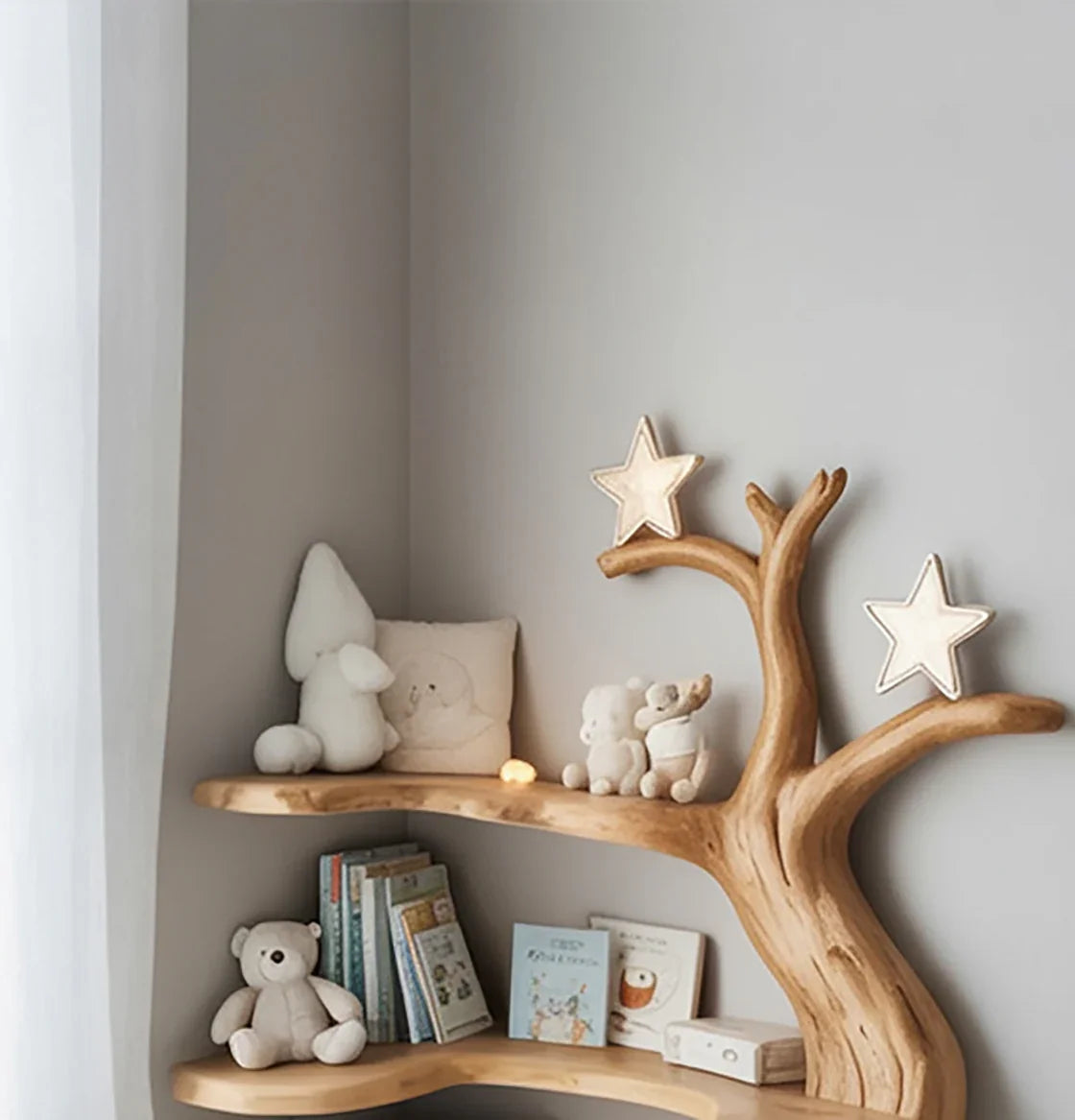Wooden tree-shaped corner shelf with soft plush toys and children's books in cozy nursery
