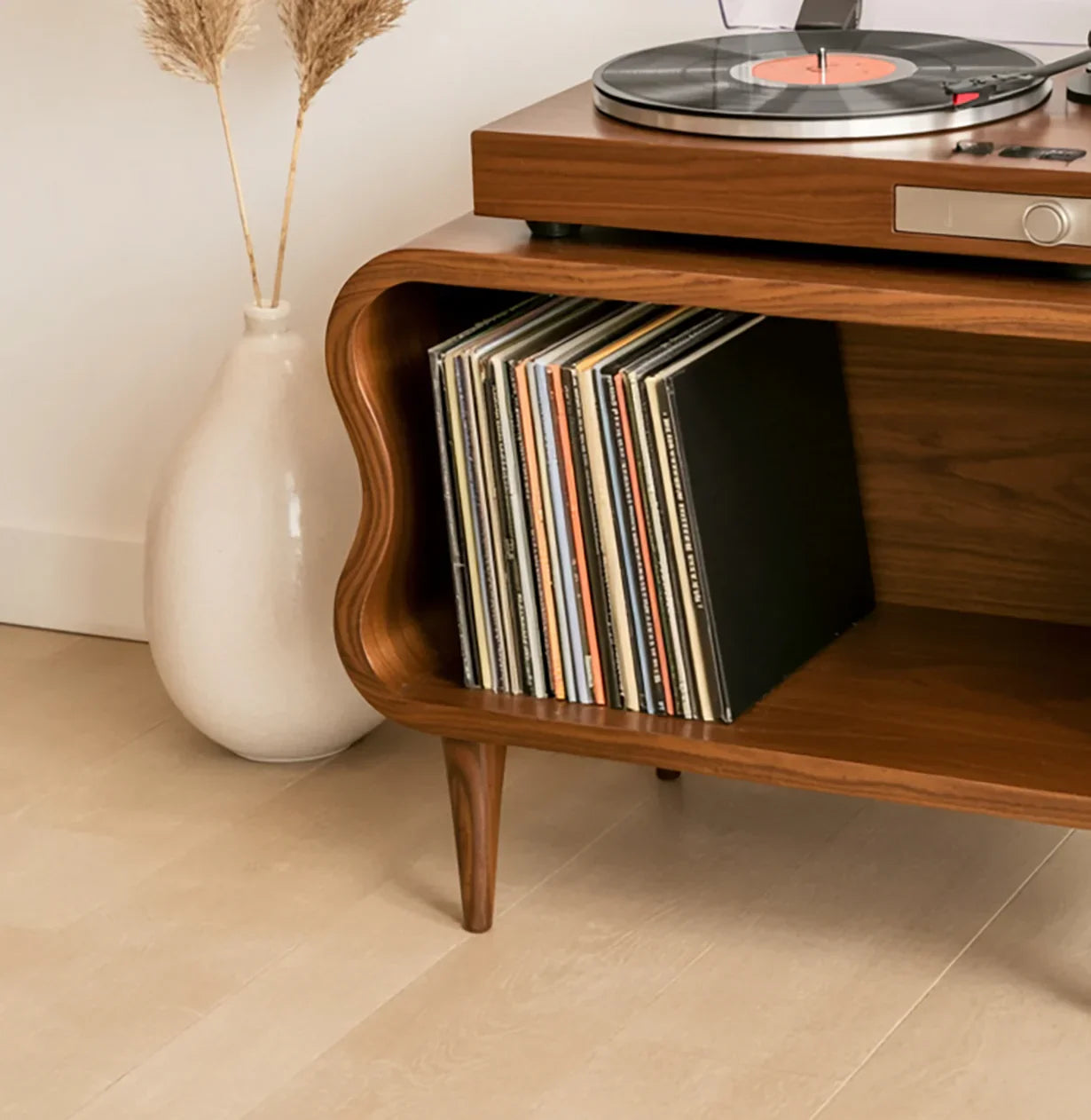 Solid wood record player stand with vinyl storage, mid-century modern design, decorative vase