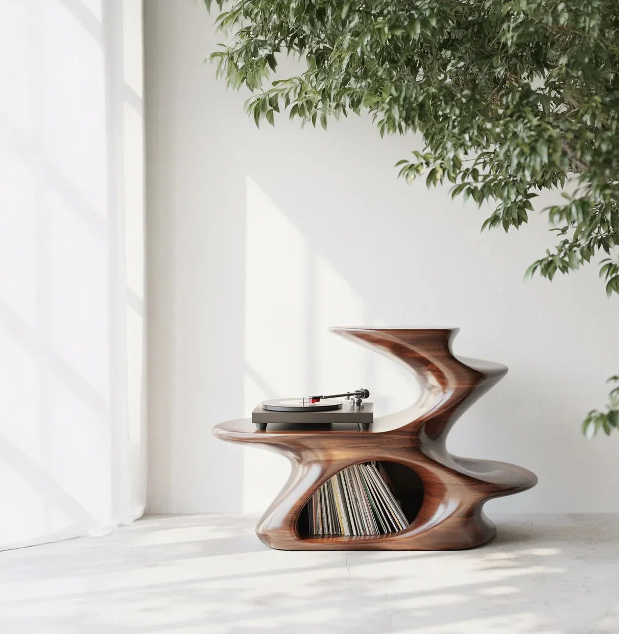 Sculptural live edge wood table with vinyl records and turntable in a sunlit room