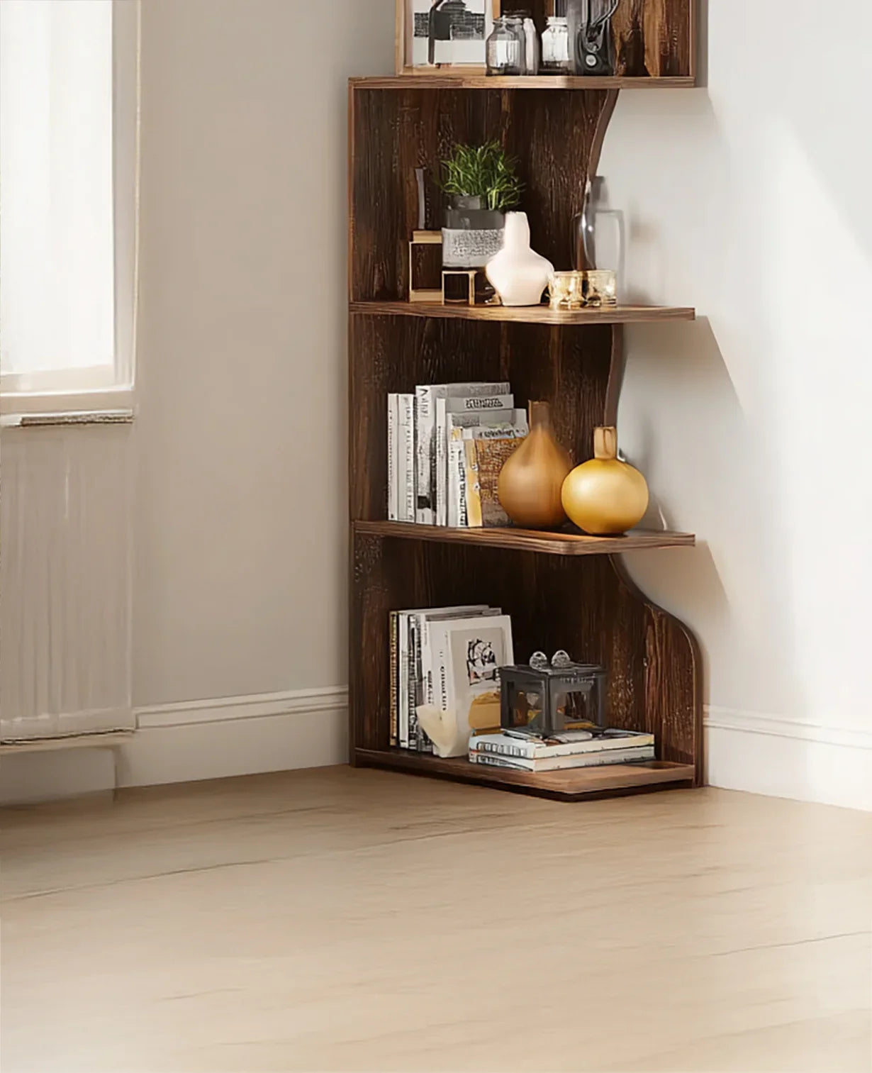 Corner wooden bookshelf with decorative vases, books, and small plant in minimalist room