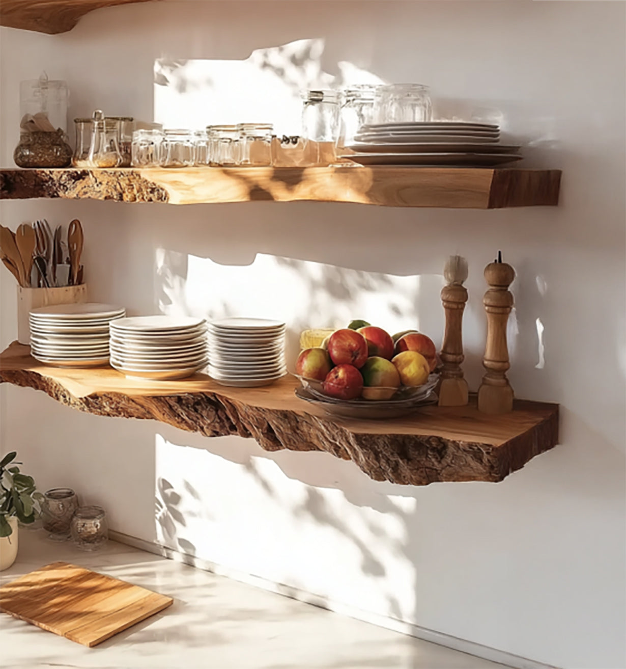 Rustic live edge wooden kitchen shelves with stacked plates, glass jars, fruit bowl, and wooden utensils in sunlight