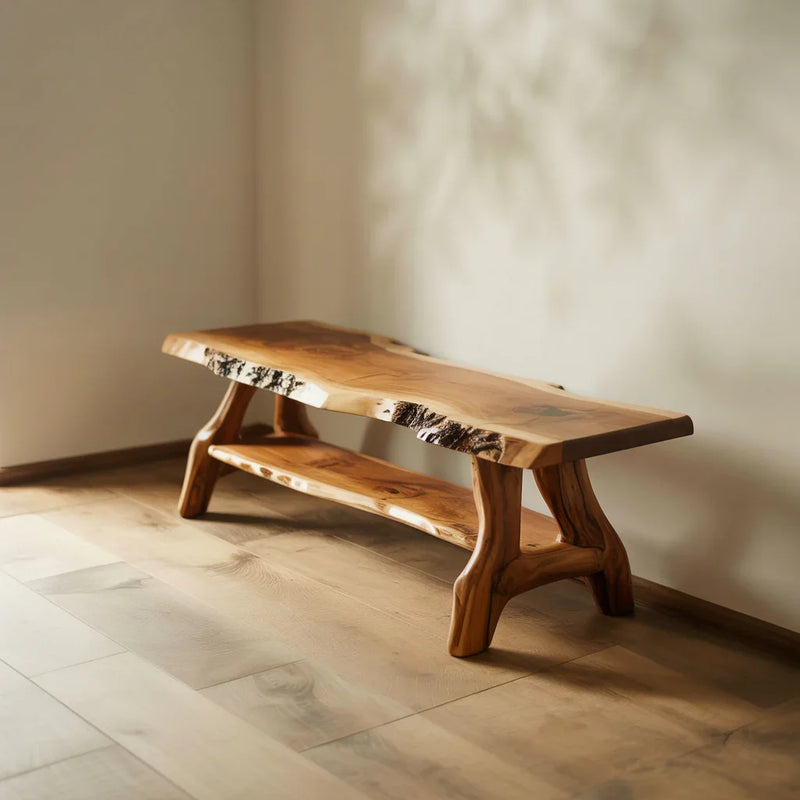 Solid wood live edge bench with lower shelf in a sunlit room on hardwood floors