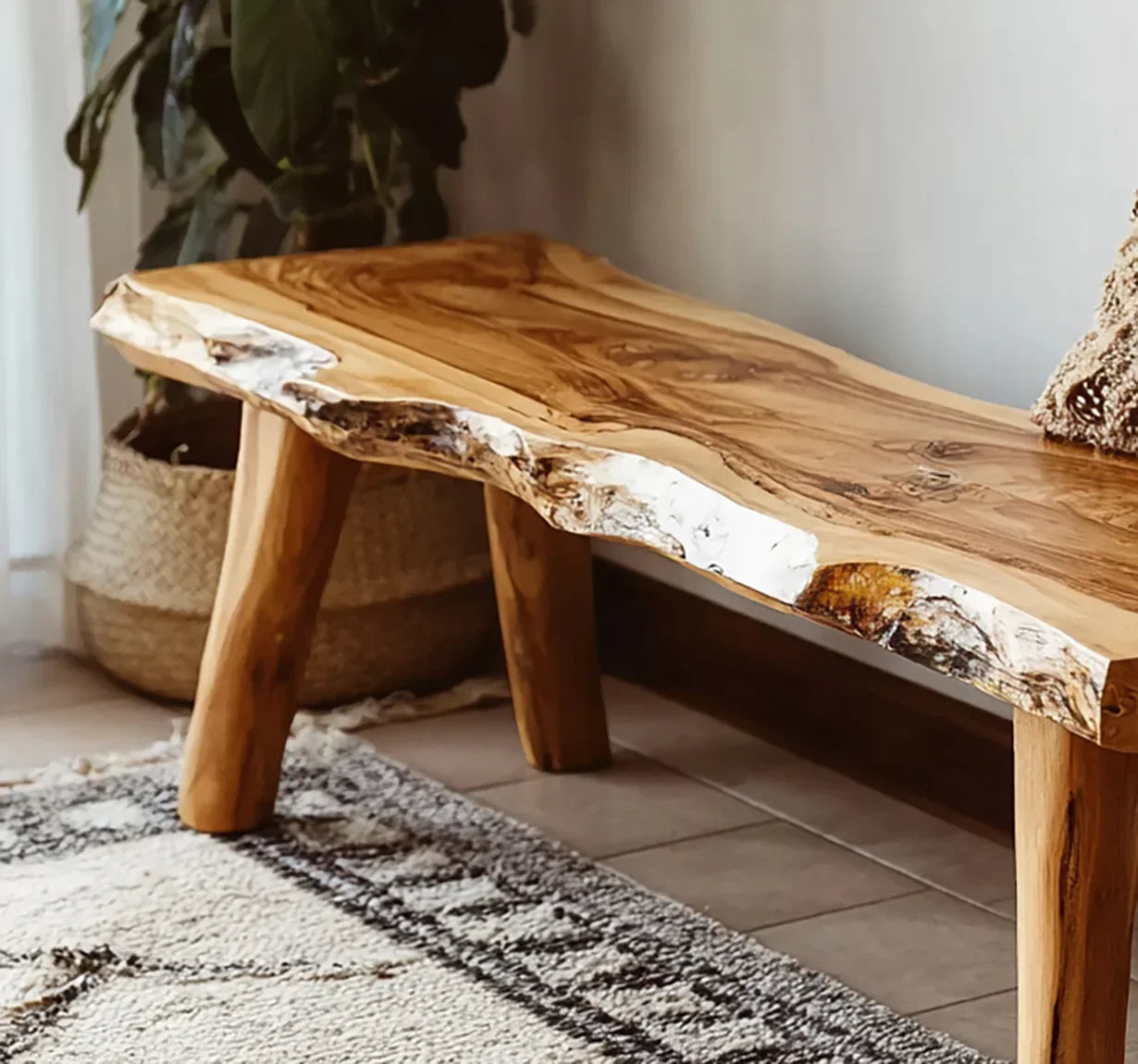 Live edge wooden bench with natural finish in cozy home interior, solid wood furniture