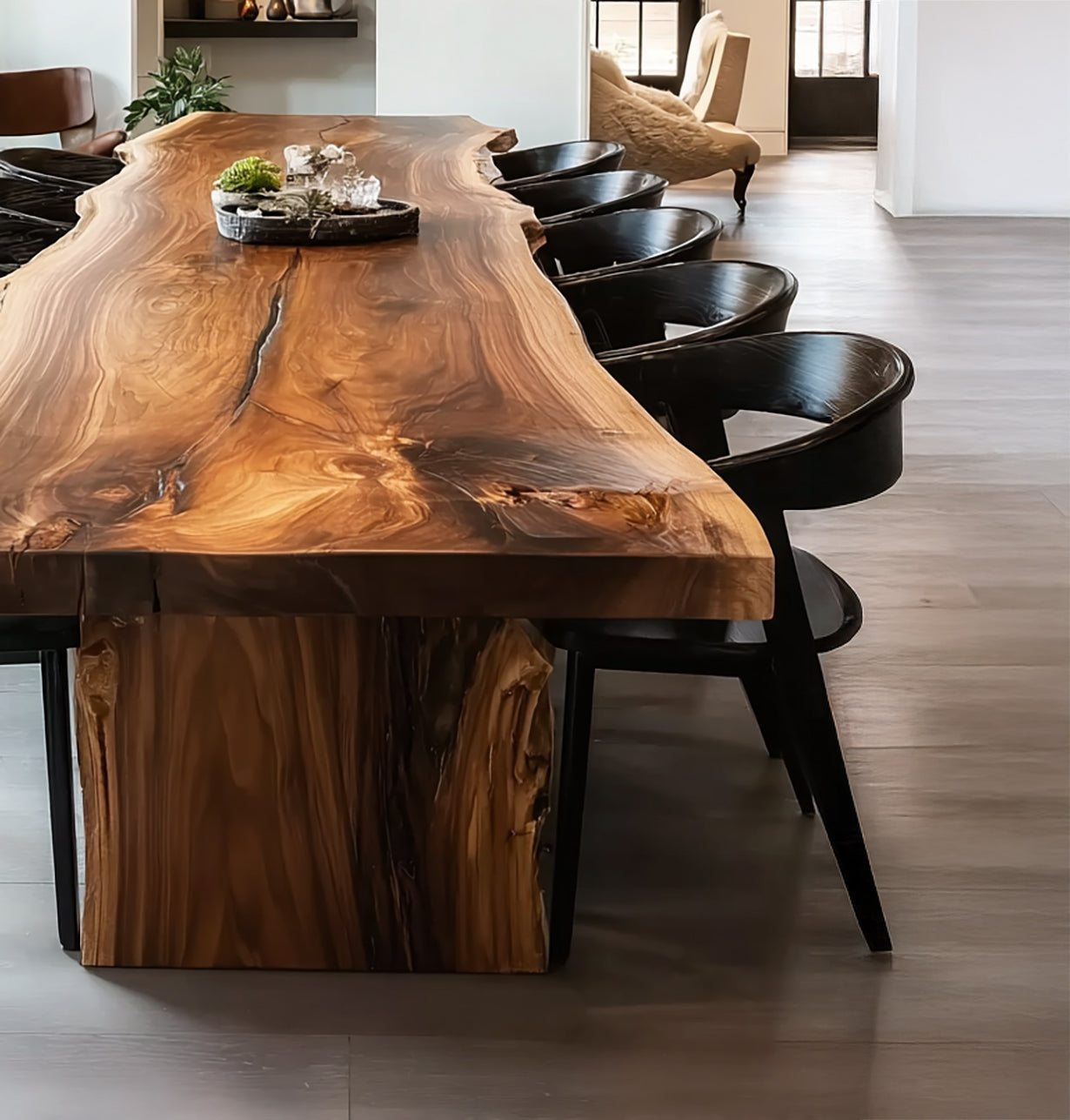 Long live edge wooden dining table with natural grain and black chairs in modern interior