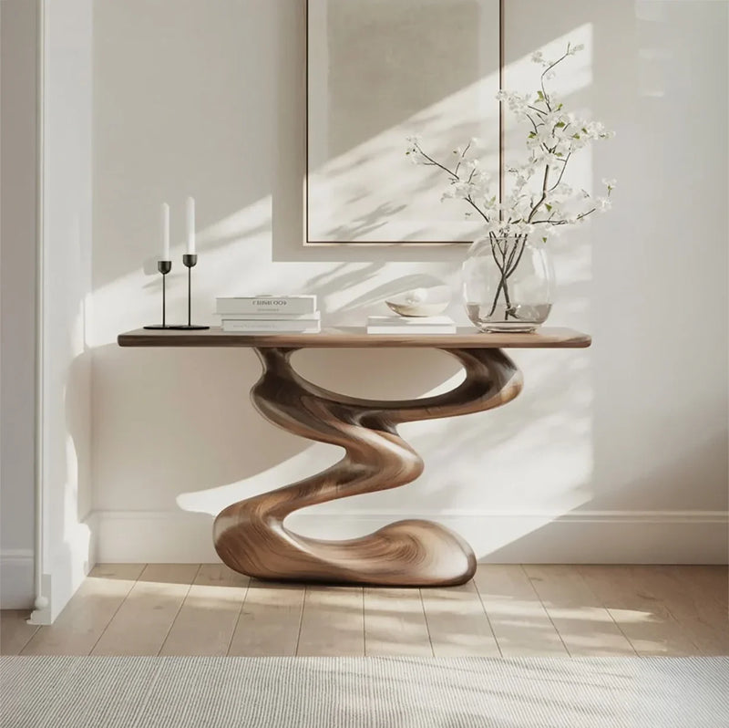 Sculptural live edge wood console table with organic base in modern, sunlit room