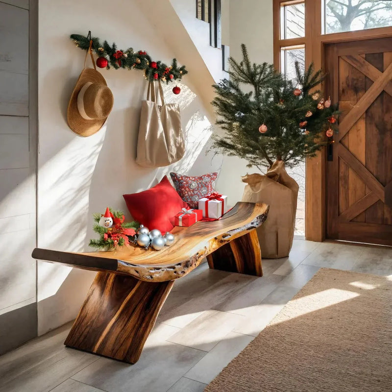 Cozy holiday entryway with wooden bench, Christmas tree, red and silver decorations, and wrapped gifts