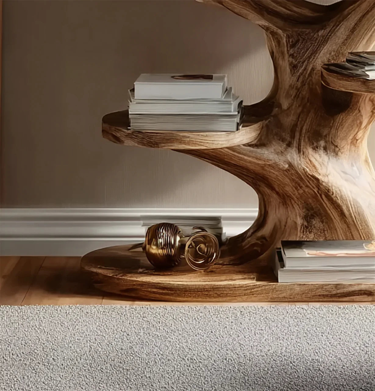 Modern wooden coffee table with stack of books and decorative metallic vase on carpeted floor