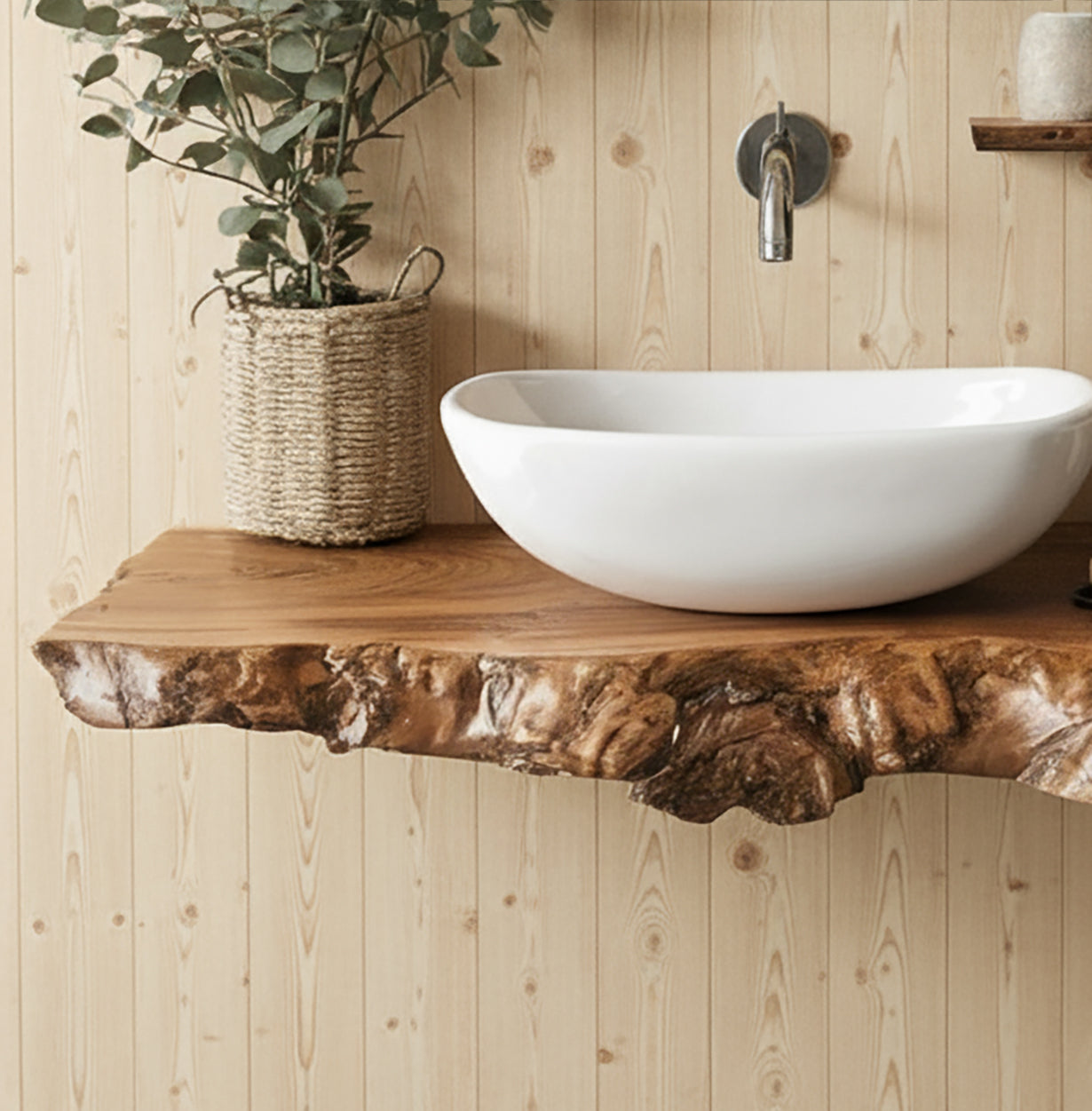 Modern bathroom sink with white basin on live edge wood countertop and woven plant basket