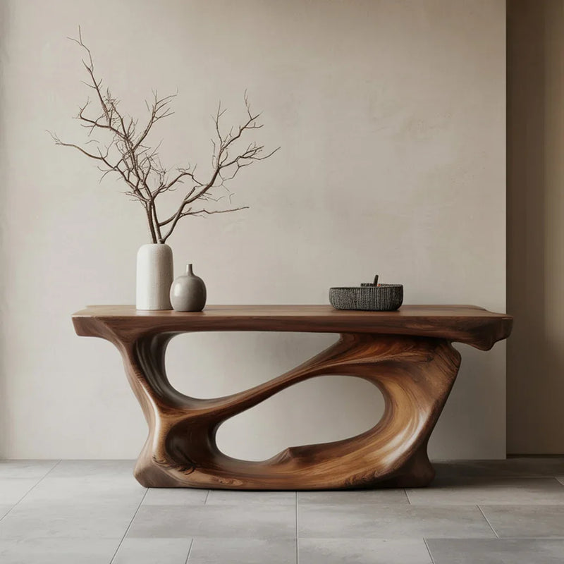 Sculptural live edge solid wood console table with vases and branch decor in minimal room