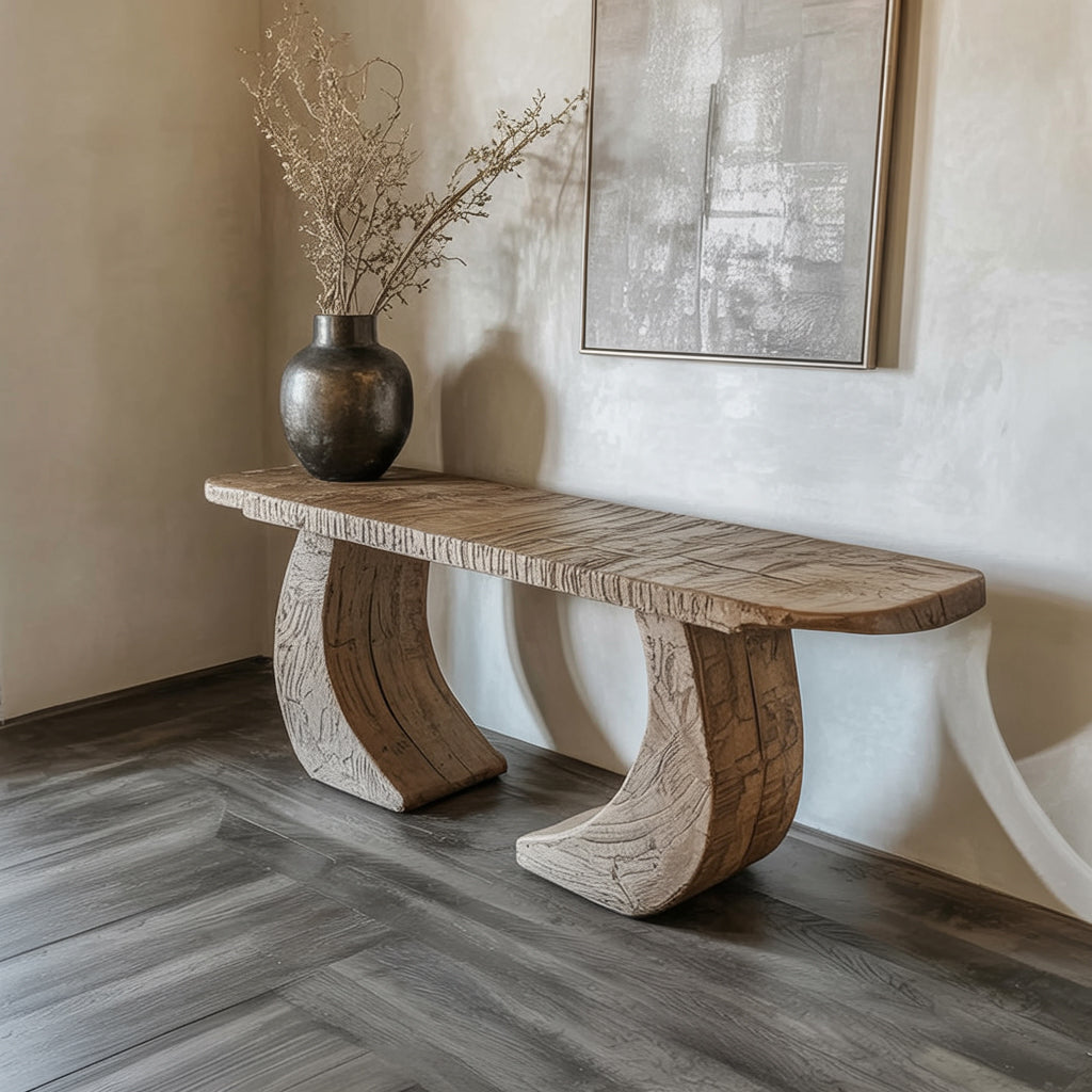 rustic wooden bench with curved legs in minimalist room with dried branches in dark vase and abstract wall art