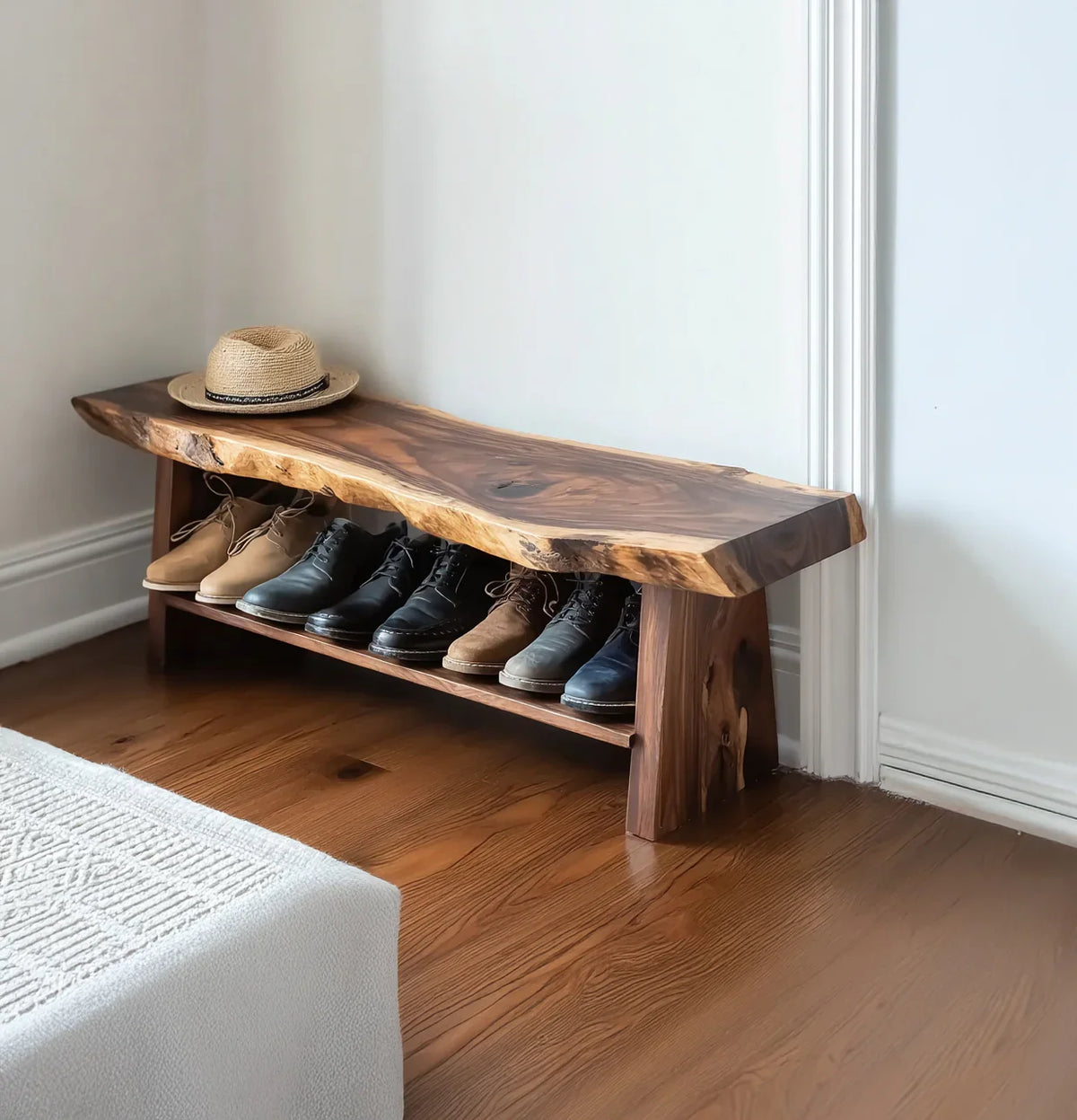 Live edge solid wood bench with shoe storage in a bright entryway
