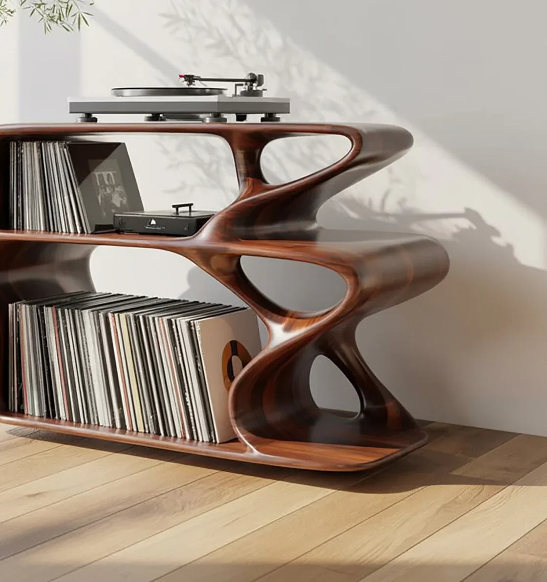Modern sculpted wood record shelf with vinyl storage and turntable, on hardwood floor