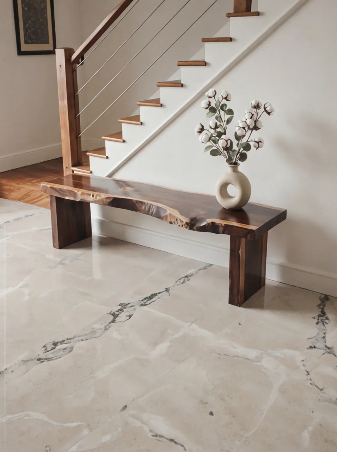 Live edge wood bench with natural finish, modern vase and flowers, entryway decor