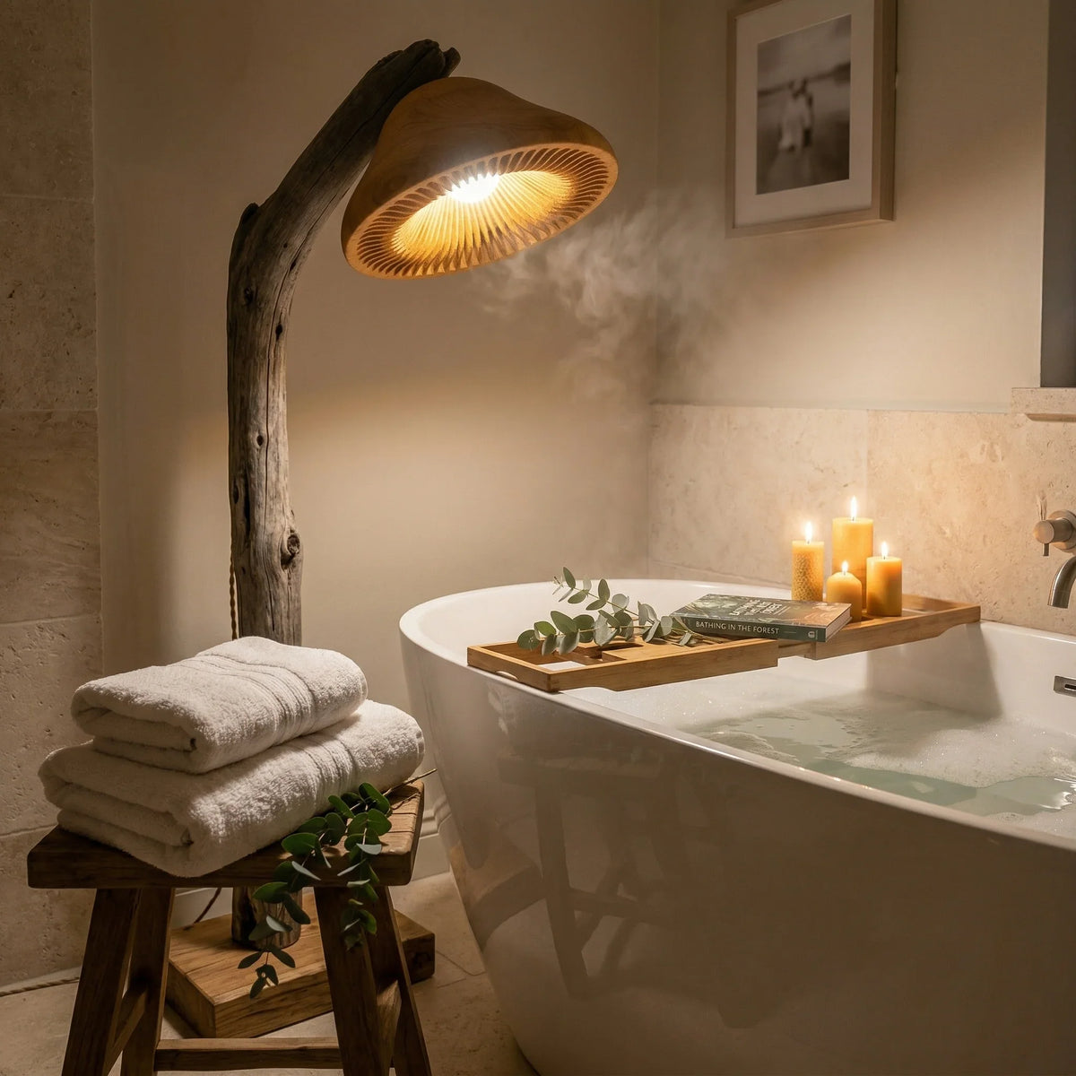 Driftwood mushroom reading floor lamp with oak base beside a bathtub in a cozy bathroom