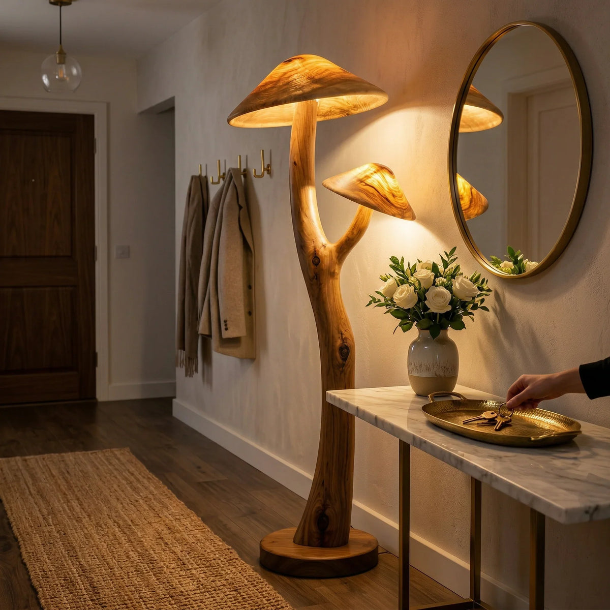 Dual mushroom floor lamp with glowing wood caps on sculpted branch stem and walnut base