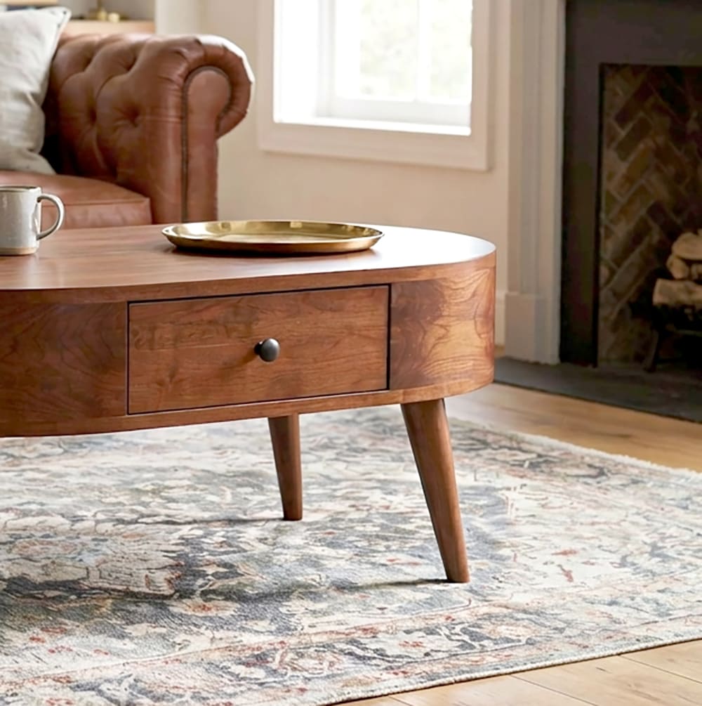 Japandi style solid wood coffee table featuring a sculptural curved design and built-in storage