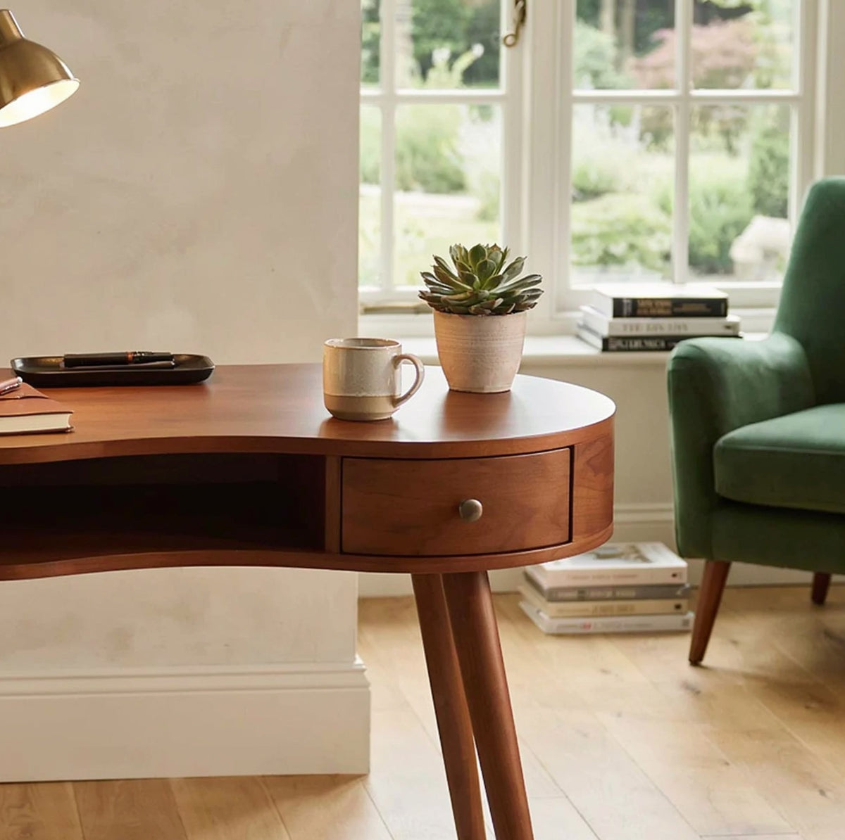 Organic modern solid wood desk featuring graceful curved lines and live edge inspiration