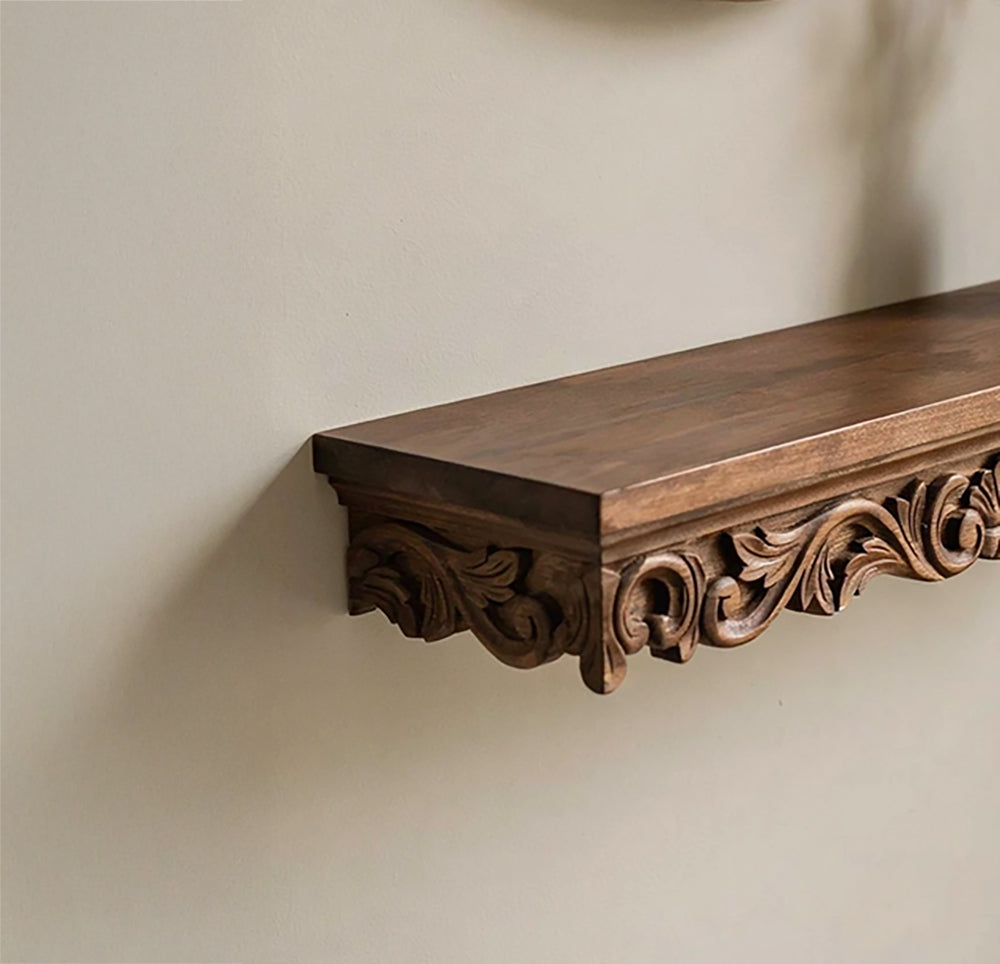 Hand-carved solid wood wall shelf featuring intricate scrollwork details