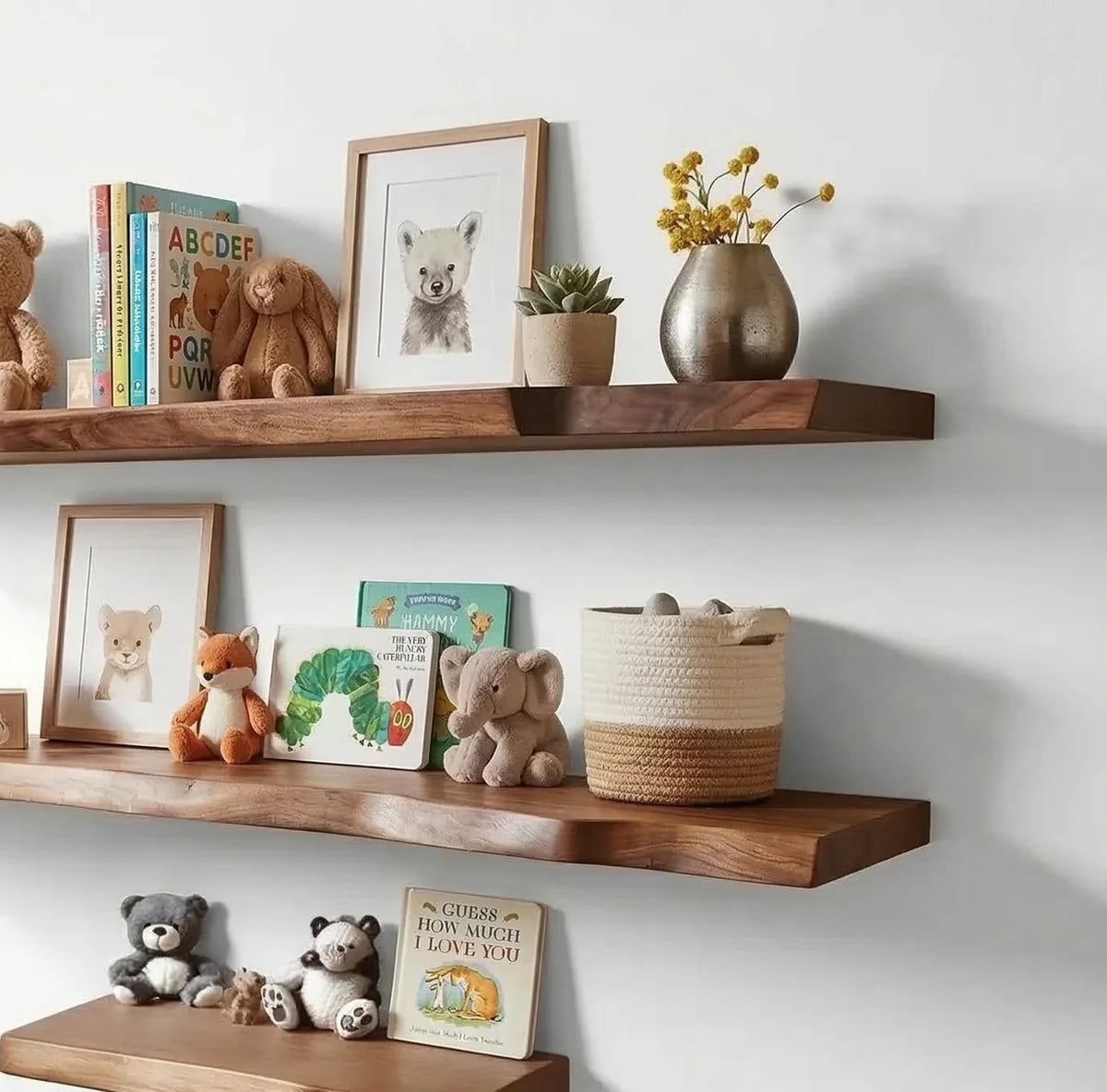 personalized solid wood nursery shelves in kids room with books, toys, and decor items