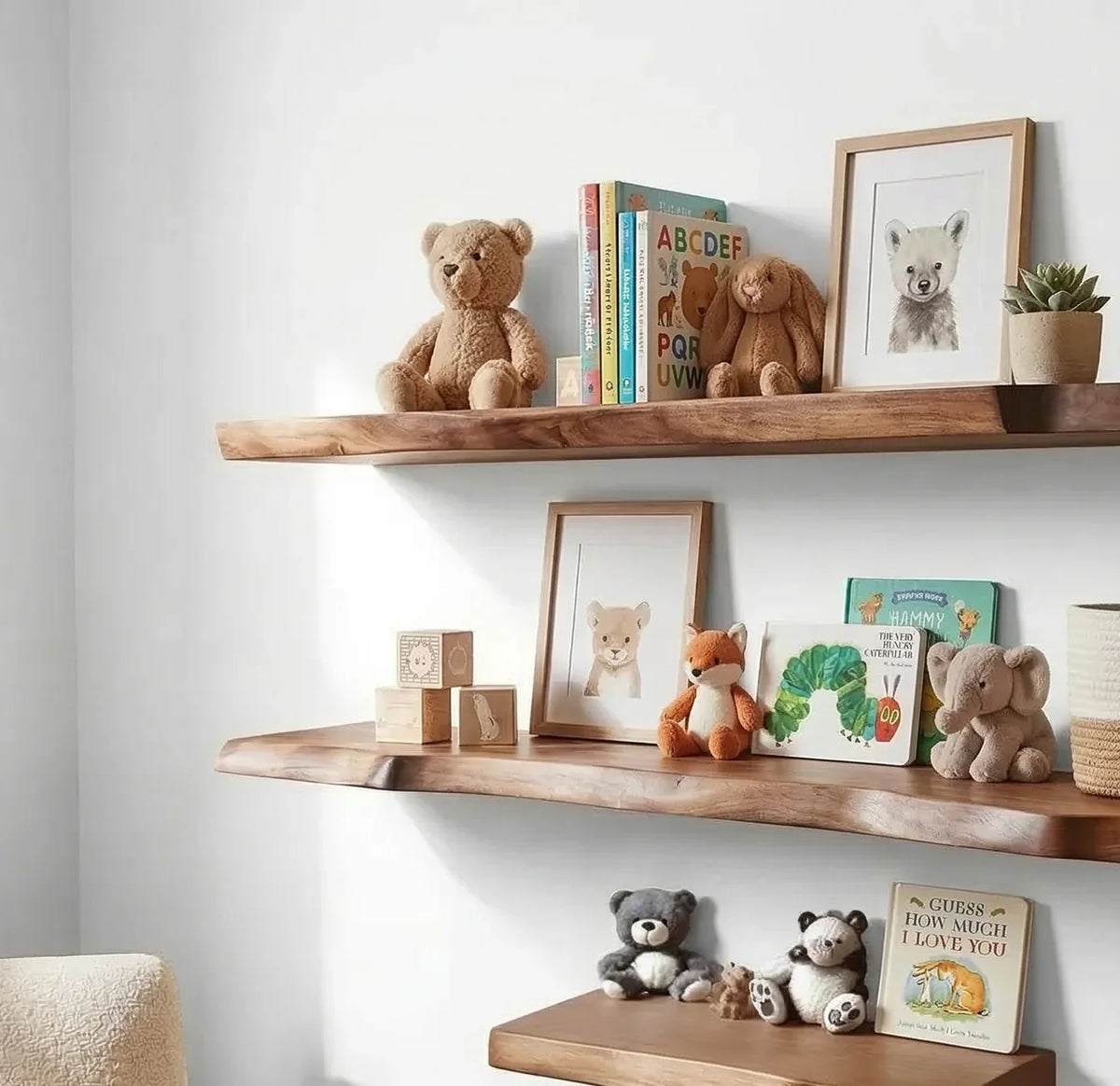 personalized solid wood nursery shelves in kids room with books, toys, and decor items