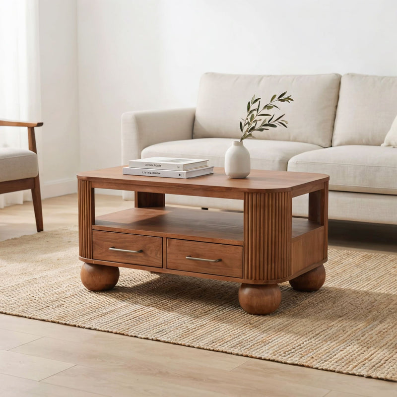 Fluted coffee table crafted from premium solid wood with drawers and spherical legs
