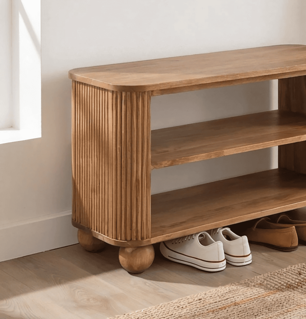 Modern solid wood bench featuring elegant fluted detailing and rounded leg design