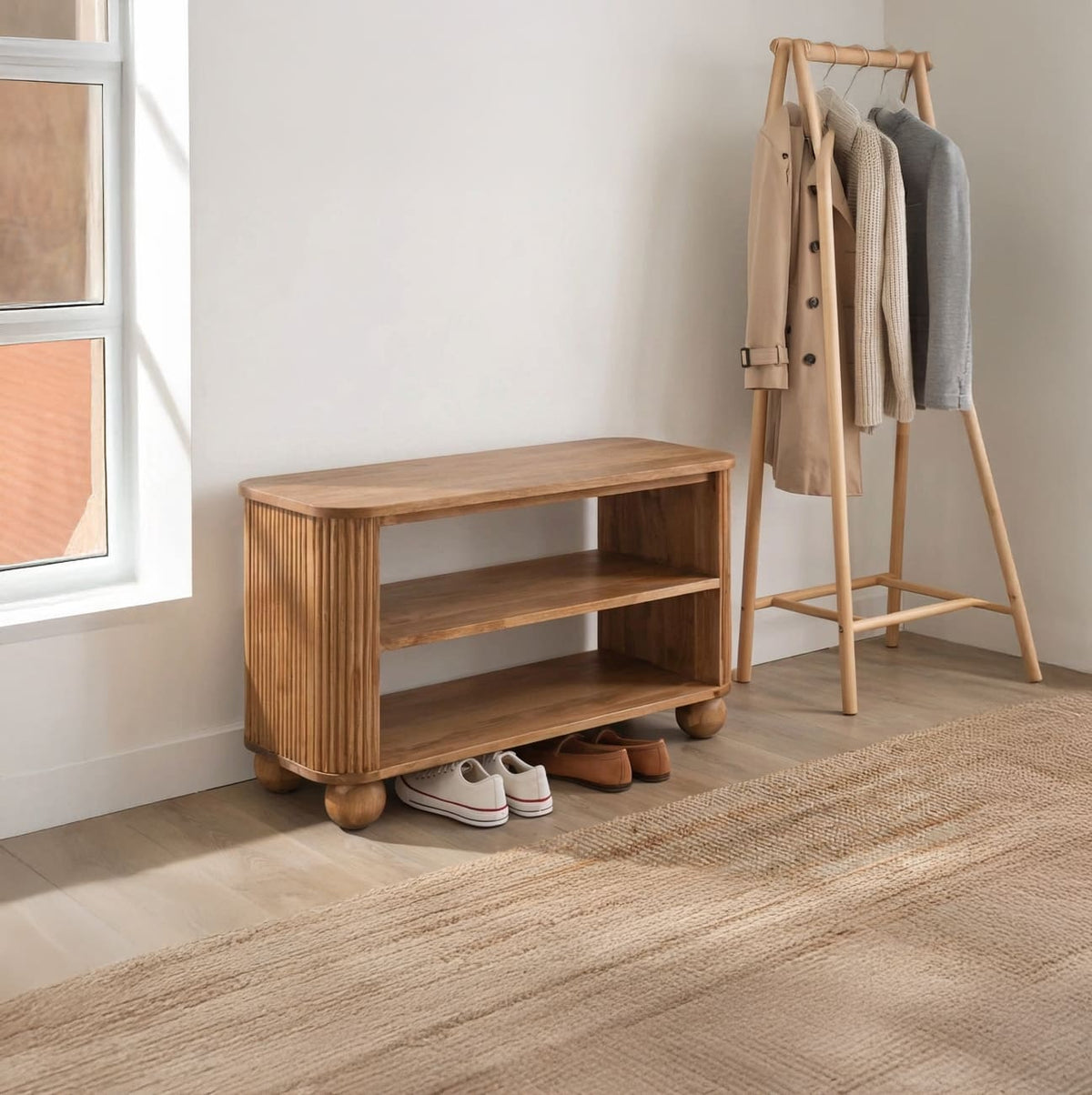 Handcrafted entryway bench with spherical legs displayed in a contemporary foyer