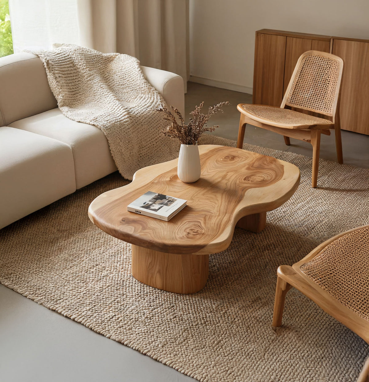 Live edge solid wood coffee table styled in a contemporary living room
