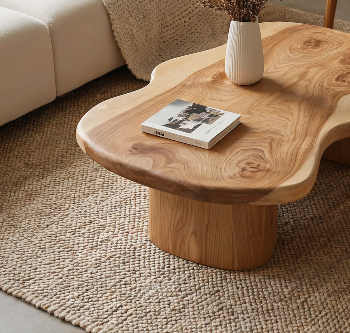 Organic modern live edge coffee table featuring an irregular solid wood silhouette