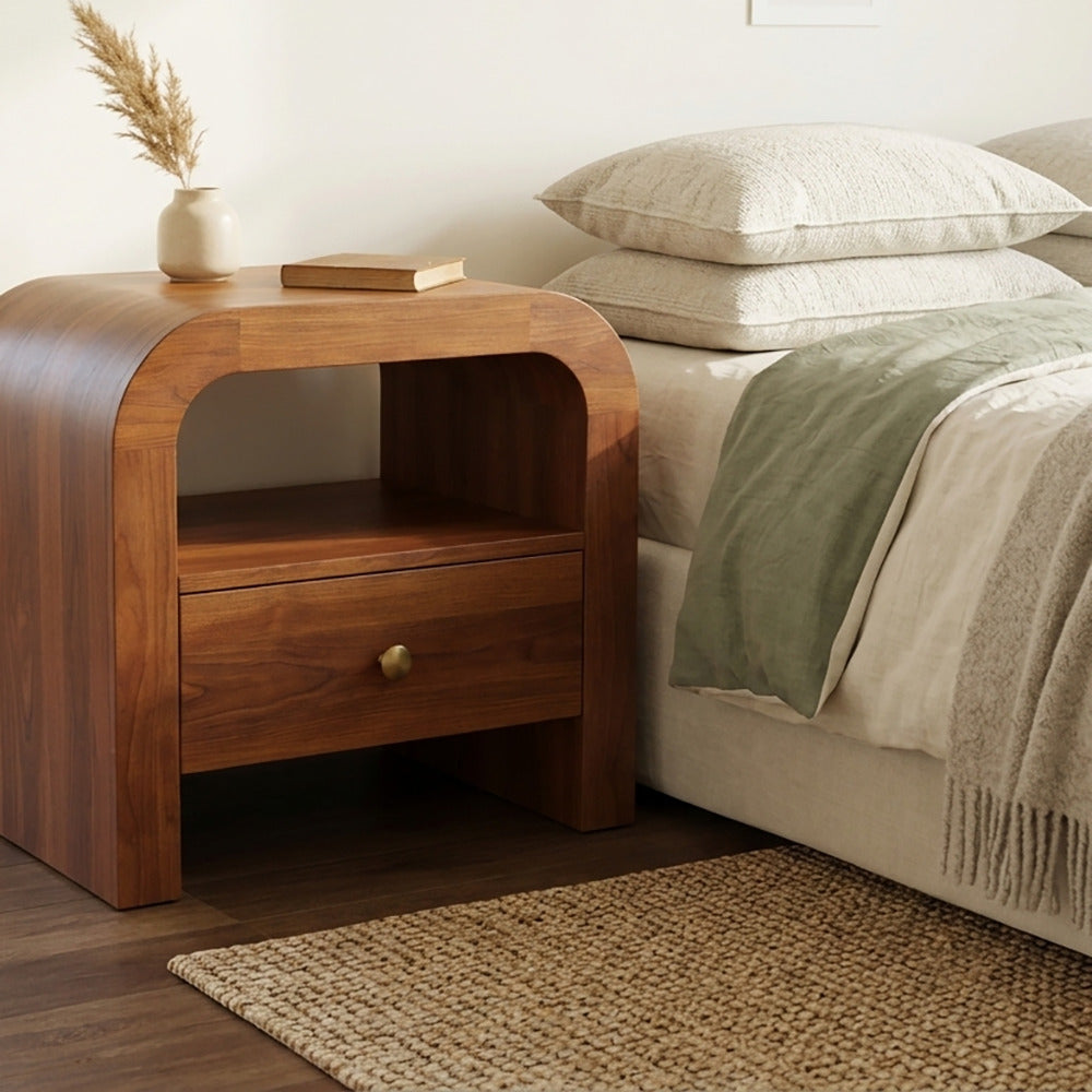 Minimalist wooden bedside table with storage in a cozy bedroom