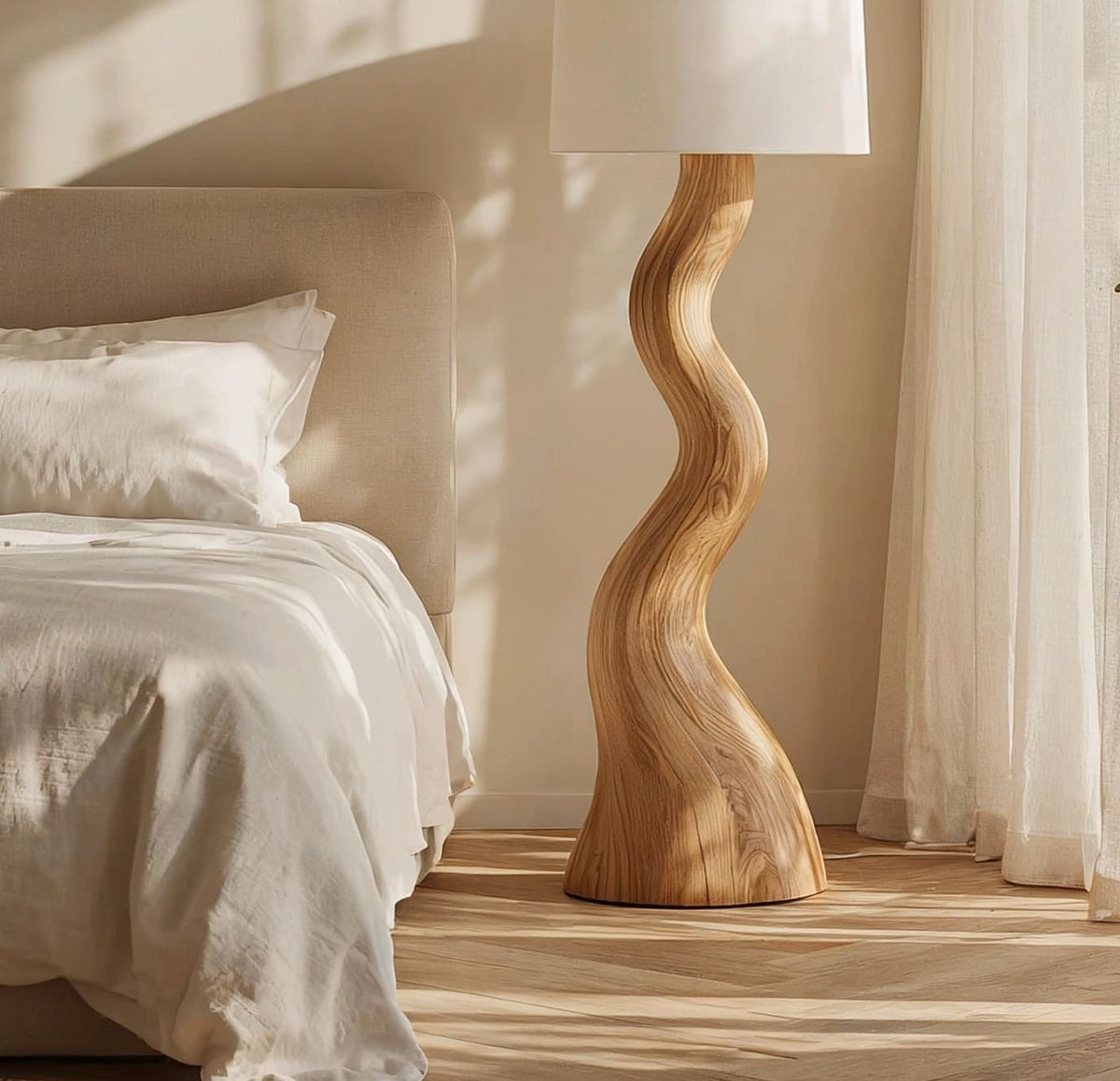 Natural wood floor lamp featuring an artistic sculptural base and fabric shade