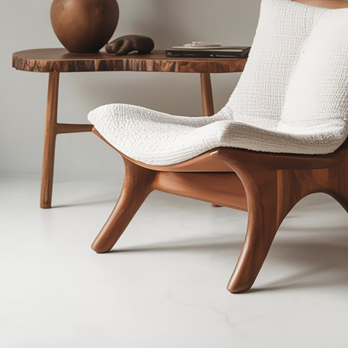 Wooden lounge chair with carved open frame design