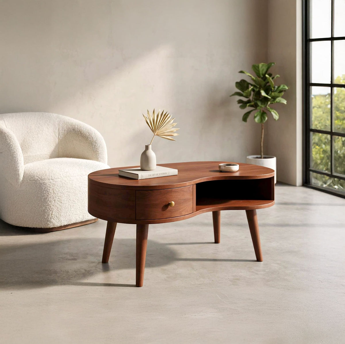 Organic solid wood coffee table with drawer styled in a contemporary living room
