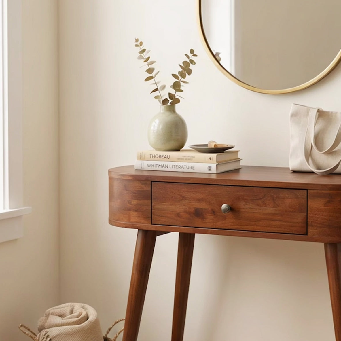 Modern Japandi solid wood console table featuring a curved silhouette and built-in drawer