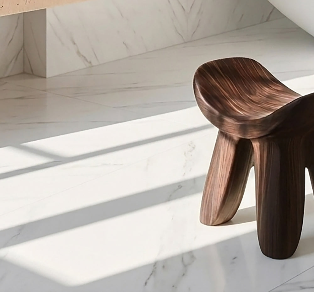 Solid wood bathroom bench featuring a sculptural curved design in Japandi style