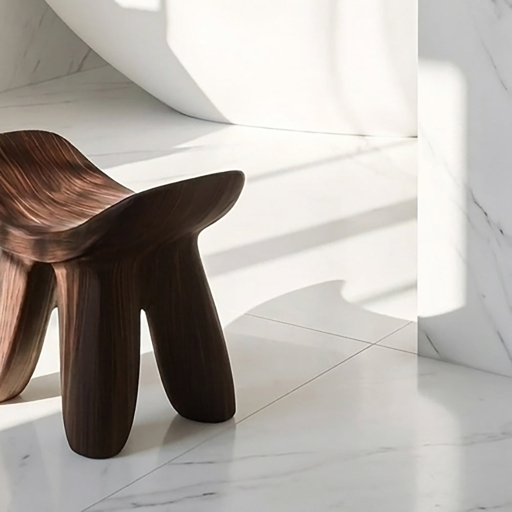 Solid wood bathroom bench featuring a sculptural curved design in Japandi style