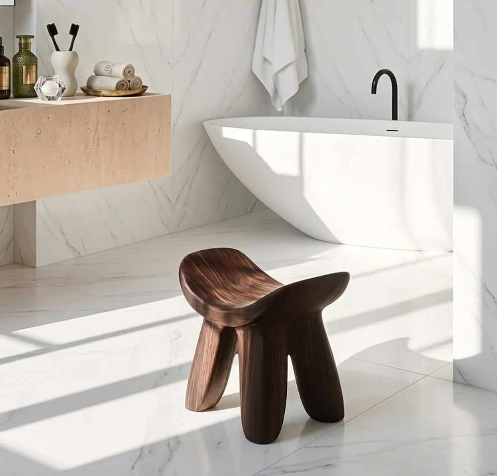 Handcrafted wooden shower stool designed for comfortable seating and everyday bathroom use