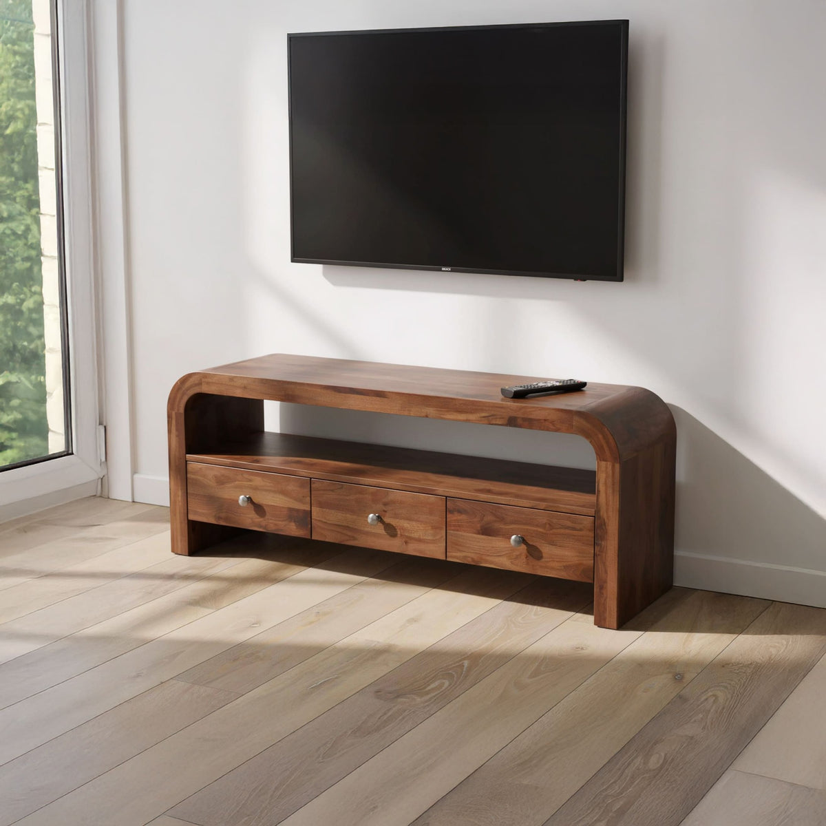 Organic modern solid wood TV stand with drawers in a contemporary living room