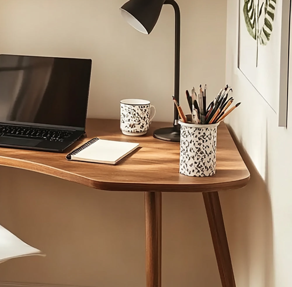 Modern sculptural work table featuring handcrafted live edge details and natural wood grain