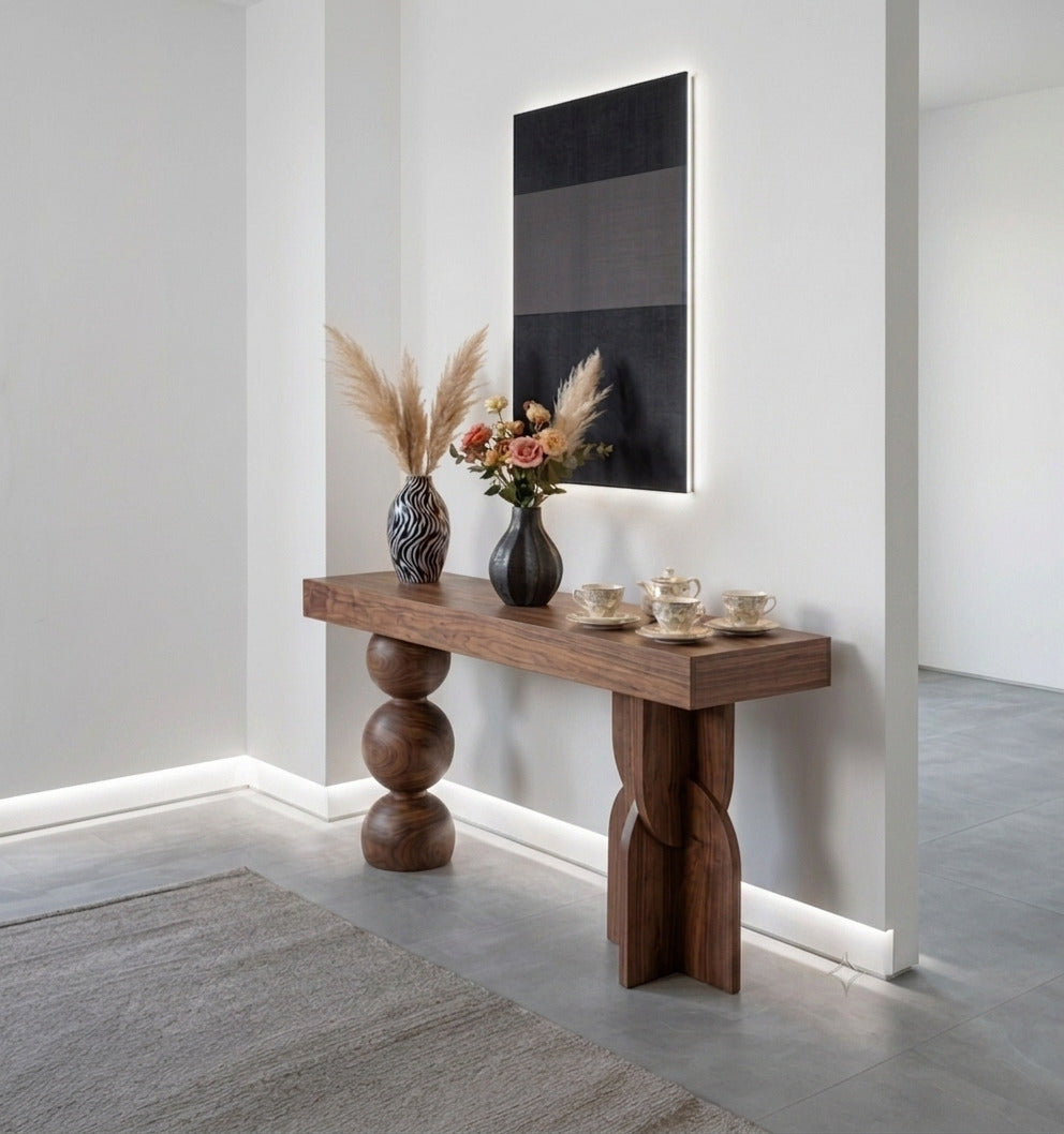 Curved solid wood console table adding natural warmth to a modern interior