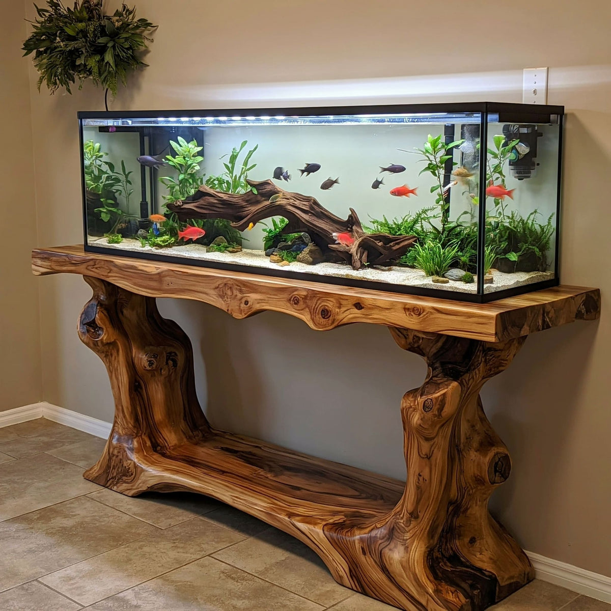 Heavy duty solid wood console table styled beneath a modern aquarium