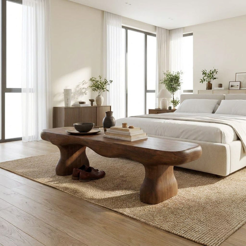 Sculptural chunky accent bench crafted from solid wood with a modern design
