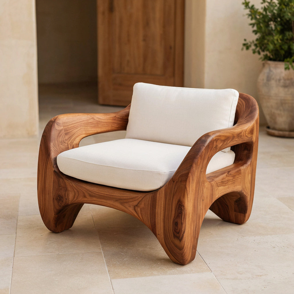 Sculptural solid wood monolithic armchair frame in a contemporary living room
