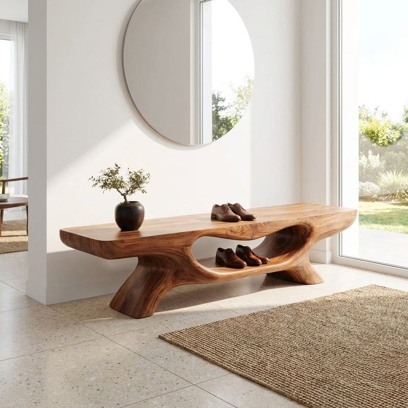 Sculptural hand-carved entryway shoe bench crafted from solid wood with organic detailing