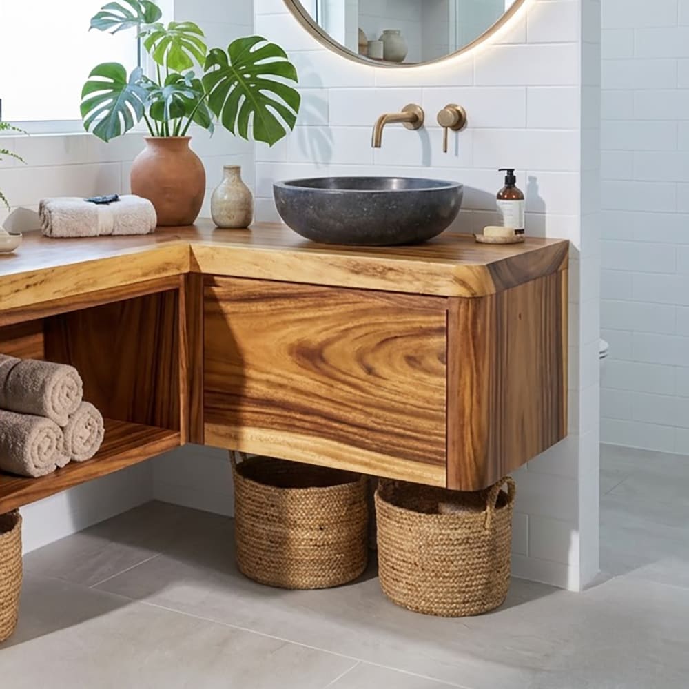 Organic L-shaped floating bathroom vanity in solid wood with a sculptural design