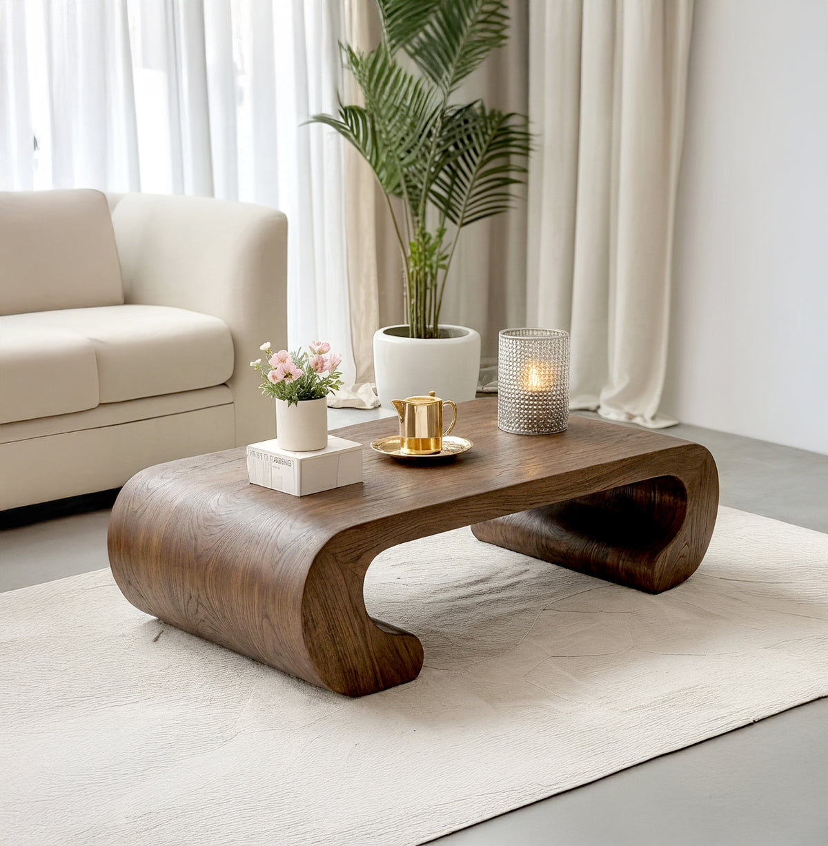 Sculptural solid wood coffee table with fluid curve design